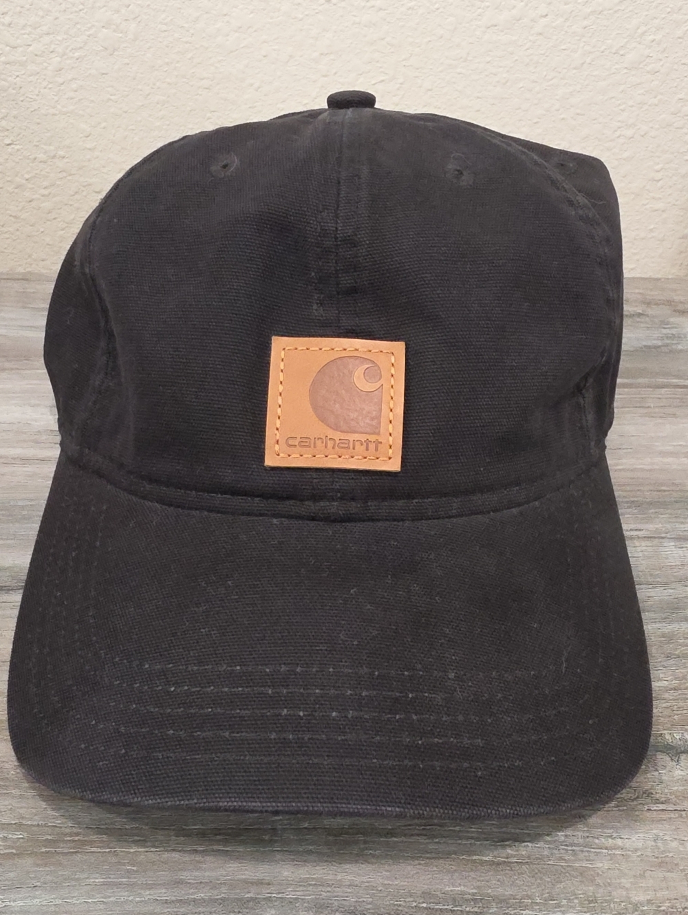 Carhartt Black Canvas Dad Hat with Tan Leather Logo Patch